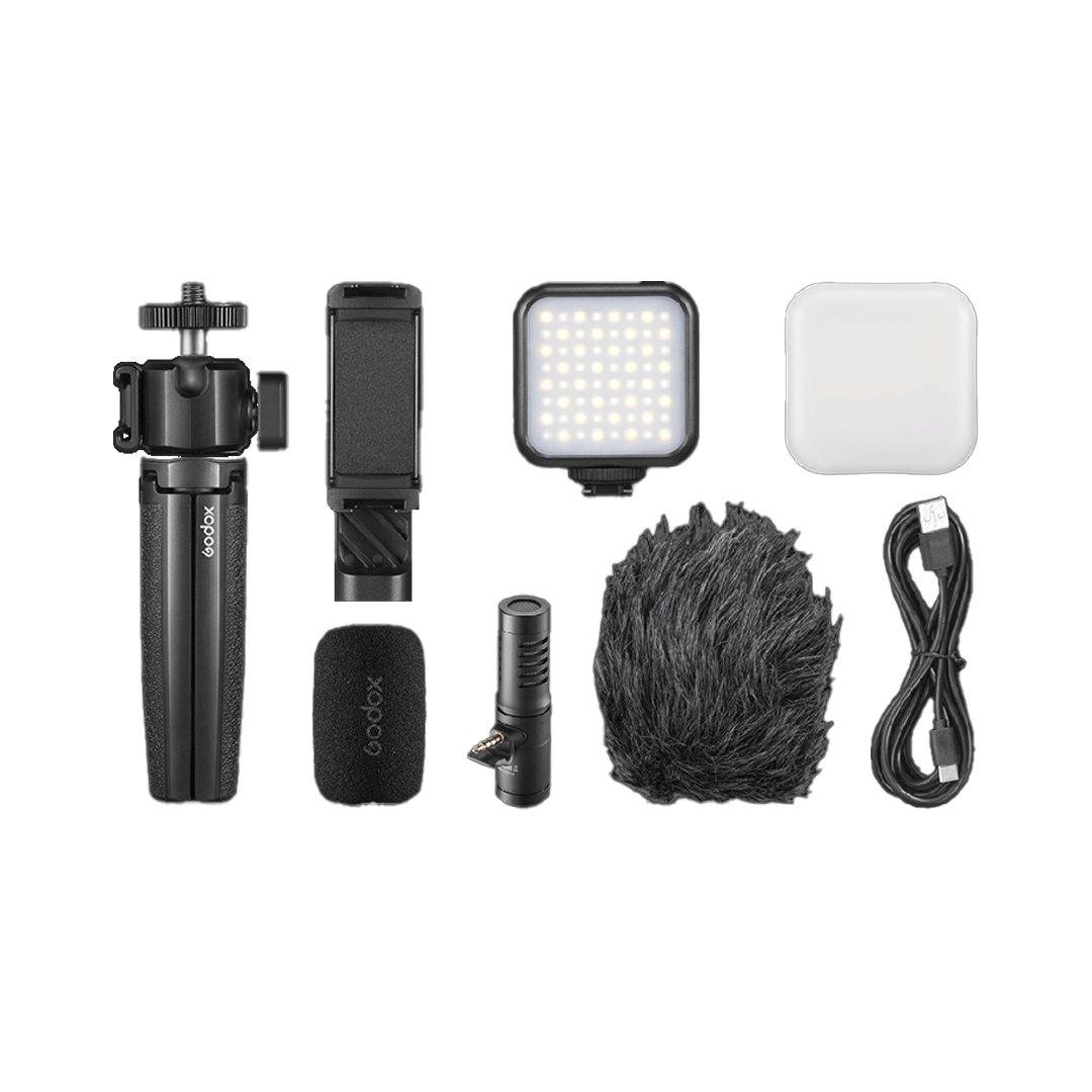 Unboxed Godox Vlog Kit VK2-AX for mobile and camera content creation including microphone, tripod, and accessories