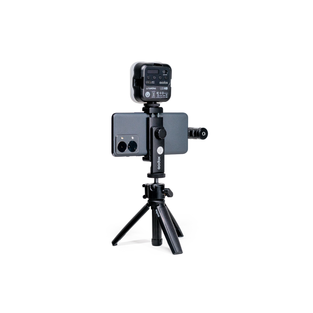 Unboxed Godox VK3-UC Vlogging Kit featuring tripod, microphone, LED light, and smartphone holder for content creators and vloggers.
