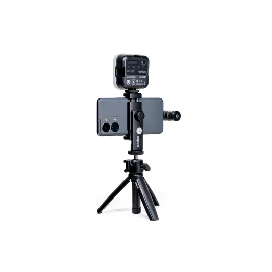 Unboxed Godox VK3-UC Vlogging Kit featuring tripod, microphone, LED light, and smartphone holder for content creators and vloggers.