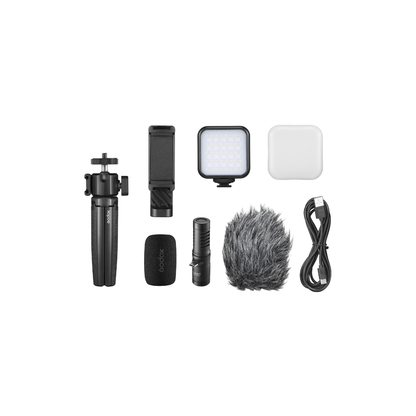Unboxed Godox VK3-LT vlogging kit showing microphone, light and accessories for content creation