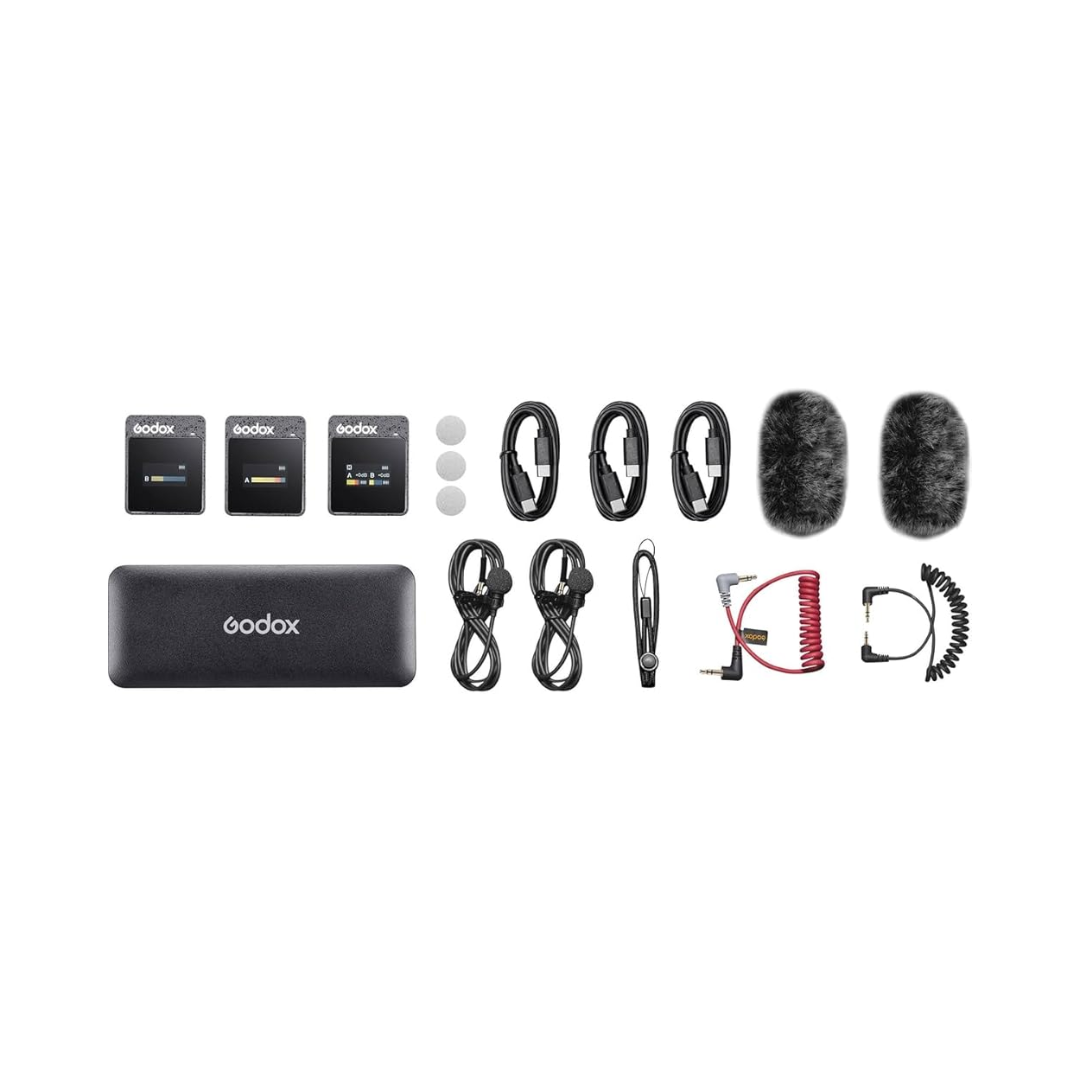 Godox MoveLink M2 wireless microphone unboxed kit for camera audio recording, ideal for vlogging and filmmaking