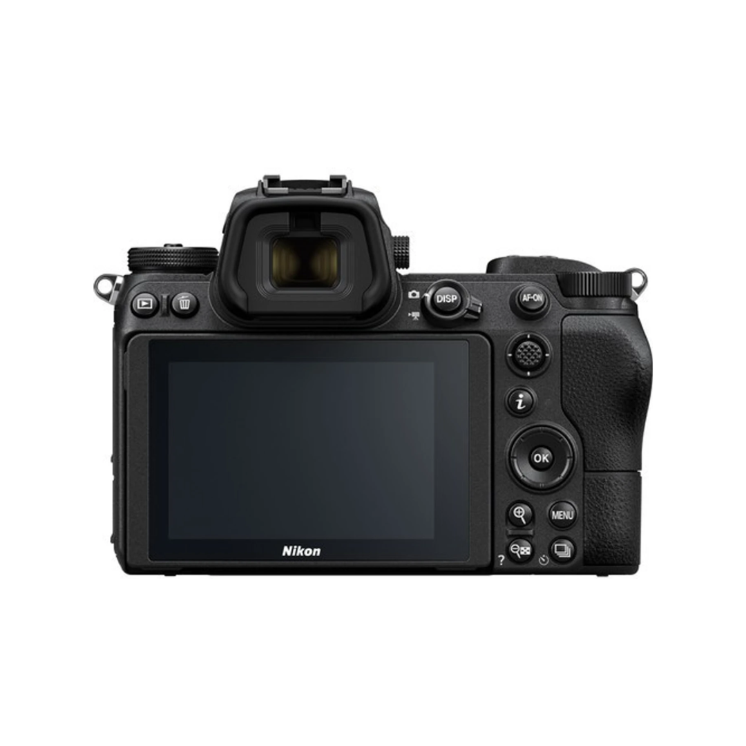 Unboxed Nikon Z7 mirrorless camera with 24-70mm lens and mount adapter, available at Camera Club.