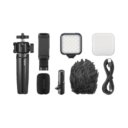 Unboxed Godox Vlog Kit VK2-AX for mobile and camera content creation including microphone, tripod, and accessories
