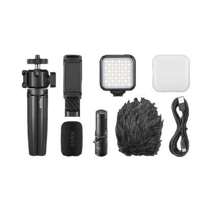 Unboxed Godox VK2-UC Vlogging Kit featuring compact microphone, tripod, and mobile accessories designed for vloggers and content creators.