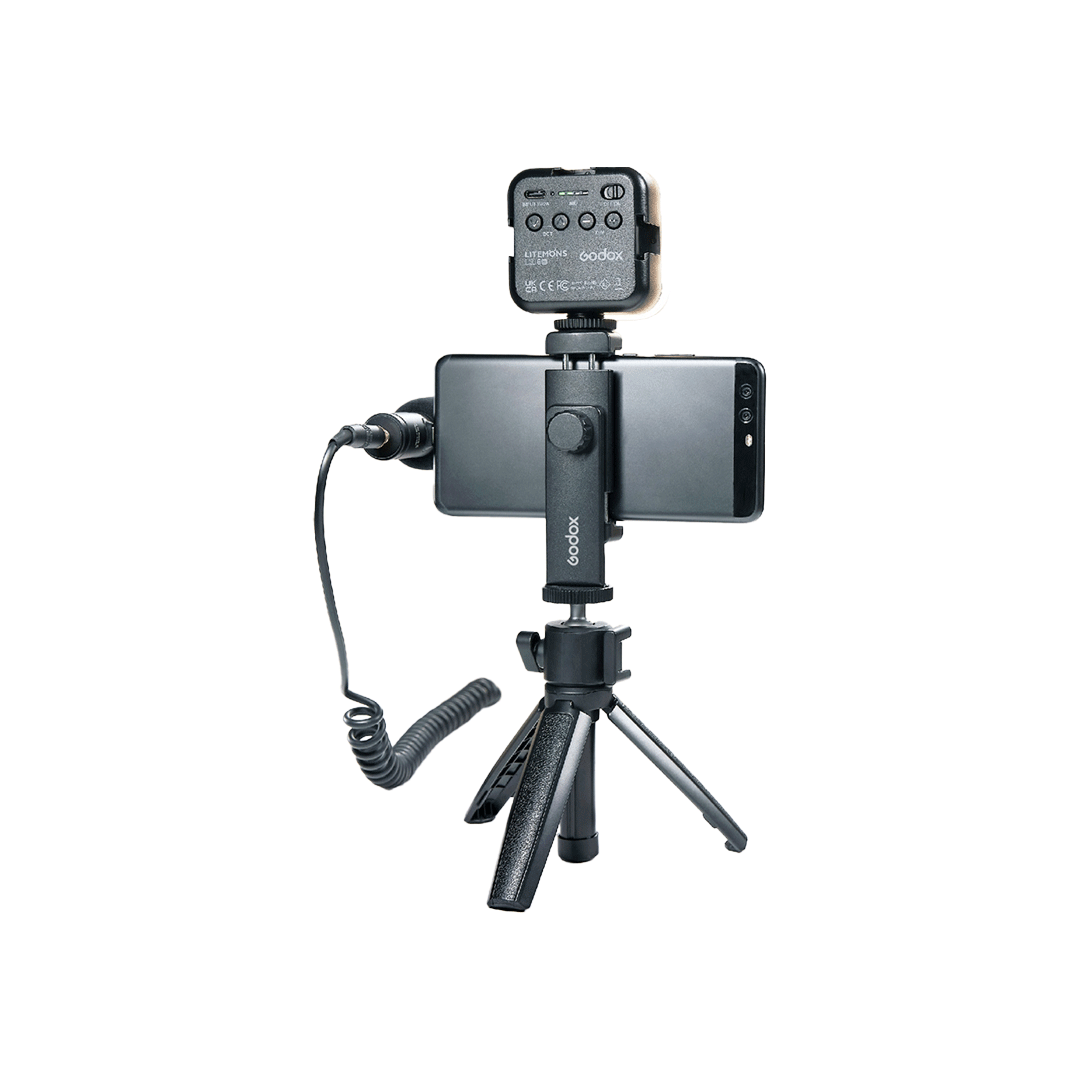 Unboxed Godox VK2-UC Vlogging Kit featuring compact microphone, tripod, and mobile accessories designed for vloggers and content creators.