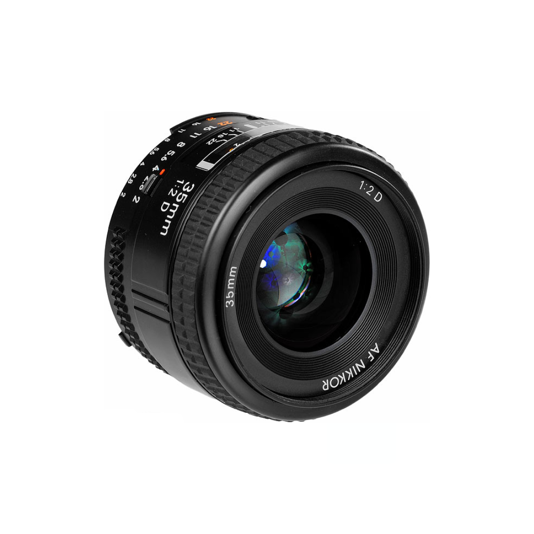 Used Nikon AF NIKKOR 35mm f/2D F Mount prime lens available at Camera Club. Compact wide-angle lens ideal for street, travel, portrait, and everyday photography.